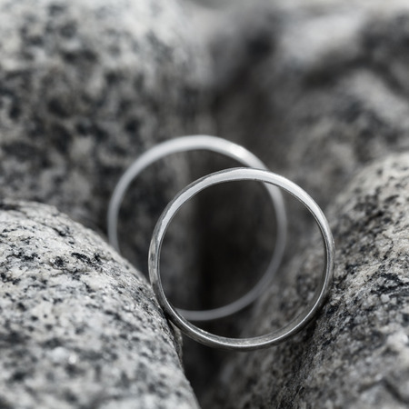 Wedding rings put on the Stone. Monochromeの写真素材
