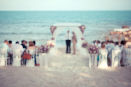 Defocus wedding ceremony venue on the beach , abstract blur background for card design, blurred wallpaper and illustration.の写真素材