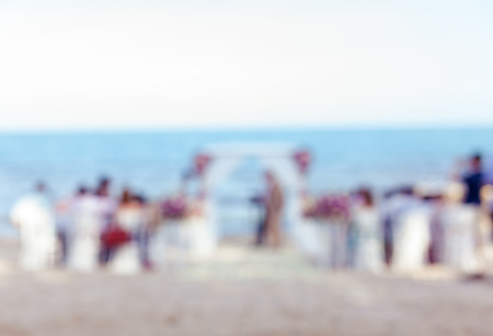 Defocus wedding ceremony venue on the beach , abstract blur background for card design, blurred wallpaper and illustration.の写真素材