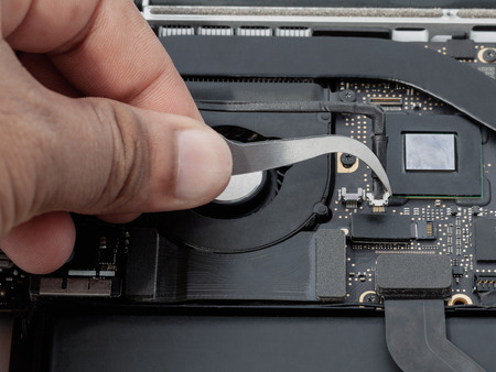 Technician support upgrade part and fixing laptop.の写真素材