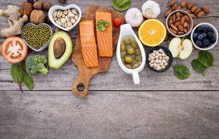 Ingredients for the healthy foods selection. The concept of healthy food set up on woodenの写真素材