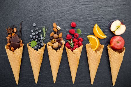Various of ingredient for ice cream flavor in conesの写真素材