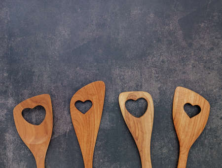 Glass bottle of olive oil and olive branch set up on dark concrete background.の写真素材