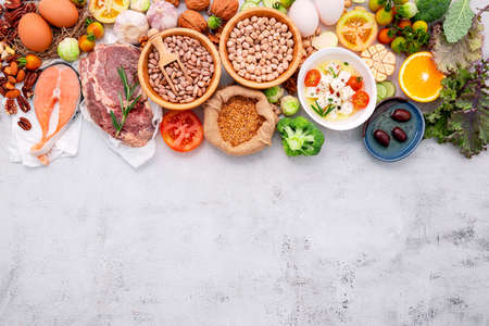 Ketogenic low carbs diet concept. Ingredients for healthy foods selection set up on white concrete background.の写真素材