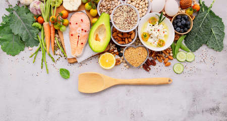 Ketogenic low carbs diet concept. Ingredients for healthy foods selection set up on white concrete background.の写真素材