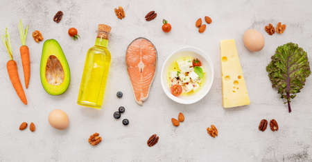 Ketogenic low carbs diet concept. Ingredients for healthy foods selection set up on white concrete background.の写真素材