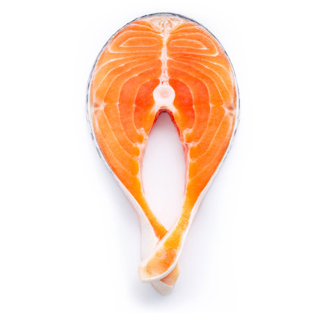 Fresh salmon fillet sliced isolate on white background. Piece of fresh salmon steak cut flat lay on white background.の写真素材
