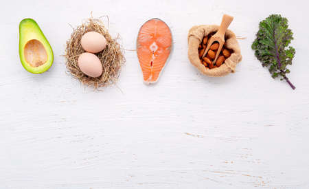 Ketogenic low carbs diet concept. Ingredients for healthy foods selection set up on white concrete background.の写真素材