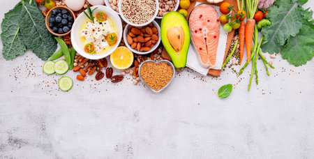 Ketogenic low carbs diet concept. Ingredients for healthy foods selection set up on white concrete background.の写真素材