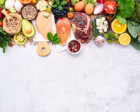 Ketogenic low carbs diet concept. Ingredients for healthy foods selection set up on white concrete background.の写真素材