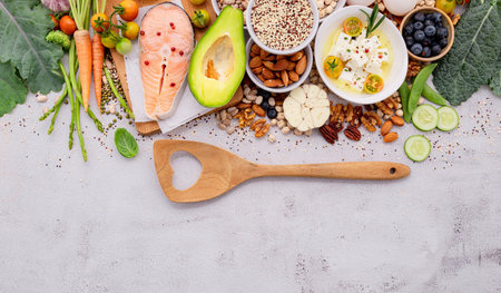 Ketogenic low carbs diet concept. Ingredients for healthy foods selection set up on white concrete background.の写真素材