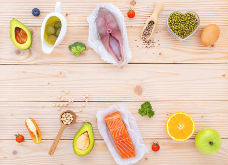 Ingredients for the healthy foods selection. The concept of healthy food set up on wooden background.の写真素材