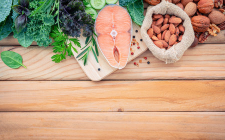 Ketogenic low carbs diet concept. Ingredients for the healthy foods selection  set up on wooden backgroundの写真素材
