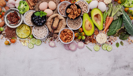Ingredients for the healthy foods selection. The concept of superfoods set up on white shabby concrete background with copy space.の写真素材