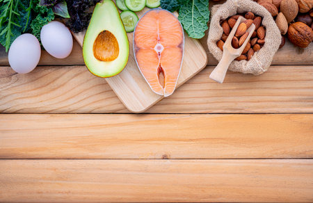 Ketogenic low carbs diet concept. Ingredients for the healthy foods selection on white background. Balanced healthy foods ingredients of unsaturated fats and fiber for the heart and blood vessels.の写真素材