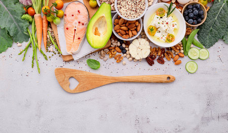 Ketogenic low carbs diet concept. Ingredients for healthy foods selection set up on white concrete background.の写真素材