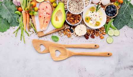 Ketogenic low carbs diet concept. Ingredients for healthy foods selection set up on white concrete background.の写真素材