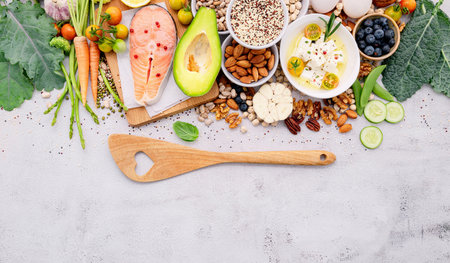Ketogenic low carbs diet concept. Ingredients for healthy foods selection set up on white concrete background.の写真素材
