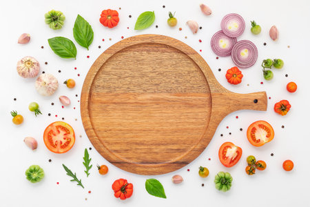 The ingredients for homemade pizza set up on white concrete background.の写真素材