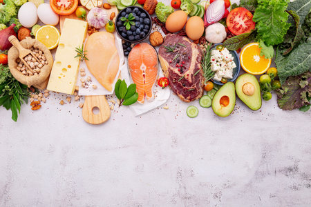 Ketogenic low carbs diet concept. Ingredients for healthy foods selection set up on white concrete background.の写真素材