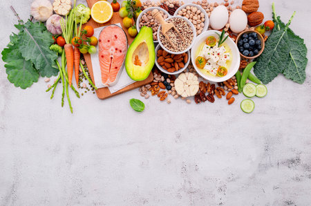 Ketogenic low carbs diet concept. Ingredients for healthy foods selection set up on white concrete background.の写真素材
