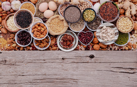 Ingredients for the healthy foods selection in ceramic bowl. The concept of superfoods set up on white shabby wooden background with copy space.の写真素材