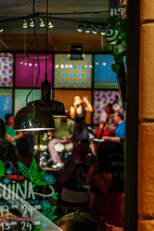Barcelona, Spain - May 3, 2015: Barcelona Attractions, a Girl Singing in a Cafe in the Gothic quarter, Carrer del Bisbe, Catalonia, Spain.のeditorial素材