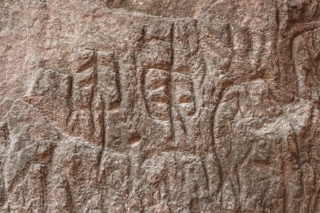 Rock formations, caves and ancient petroglyphs at Gobustan National Park, Azerbaijan.