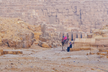 Famous Sphinx and the great pyramids in fog and smog, Giza, Cairo, Egypt