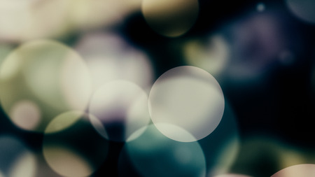 glowing particles, bokeh flow, abstract background with sparkle glitterの写真素材