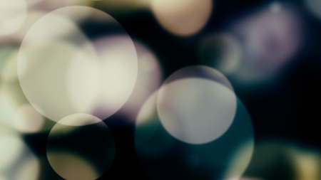 glowing particles, bokeh flow, abstract background with sparkle glitterの写真素材
