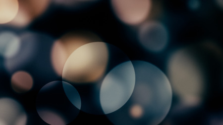 glowing particles, bokeh flow, abstract background with sparkle glitterの写真素材