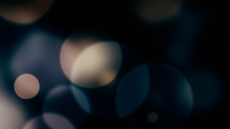 glowing particles, bokeh flow, abstract background with sparkle glitterの写真素材