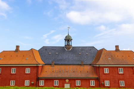 Kastellet star-shaped 17th-century fortress with ramparts, museum, old buildings, windmill, with yellow foliage on trees, Copenhagen in the fall.のeditorial素材