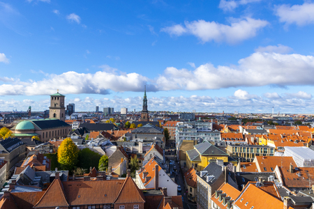 Beautiful view of the Copenhagen from top on round tower in warm sunny clear autumn weather, scenic Copenhagen cityscape in the fall, Denmarkの写真素材