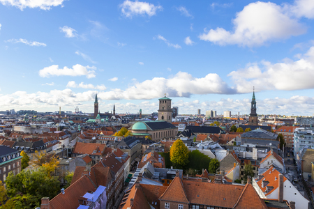 Beautiful view of the Copenhagen from top on round tower in warm sunny clear autumn weather, scenic Copenhagen cityscape in the fall, Denmarkの写真素材