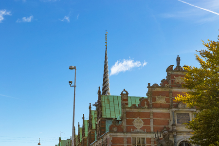 The Stock Exchange "Børsen" imposing, 17th-century, waterfront building and former stock exchange with a striking spire, historical place in the center of Copenhagen, Denmarkのeditorial素材