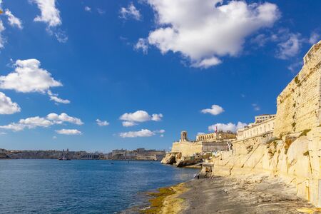Ancient fortifications of Valletta, medieval castle city stone walls fortification, grand harbour In Valletta, Maltaの写真素材