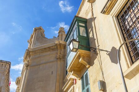 architecture, balcony, building, europe, travel, house, tourism, maltese, facade, street, malta balconies, mediterranean, landmark, cityscape, historical, island, valletta, medieval, window, historic,の写真素材