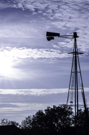 Texas Oil Rig at Sunsetの写真素材