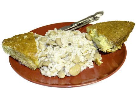 Butter Beans, Rice, and Cornbread on an isolated red plateの写真素材