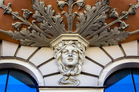 Close-up of carved face on Art Nouveau  jugendstil  building, Riga Latviaのeditorial素材