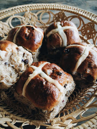 Basket with hot cross buns at Easter