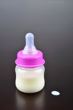 Bottle with milk for a babyの写真素材