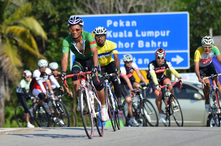 KUANTAN - JUNE 1: unidentified cyclists in action during Kuantan160 on June 1, 2014 in Kuantan, Pahang, Malaysia. KUANTAN160 is a non-profit, non-race 160KM bicycle ride around Kuantan City.のeditorial素材