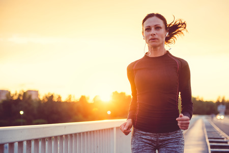 Women running in the cityの写真素材