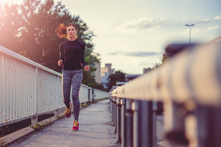 Women running in the cityの写真素材