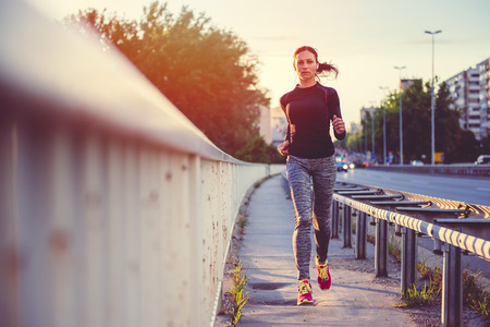 Women running in the cityの写真素材