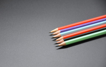 Pencil on pure black backgroundの写真素材
