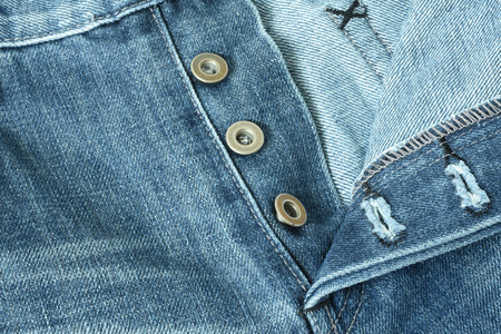 Denim Closeup : texture background of blue jeans.の写真素材
